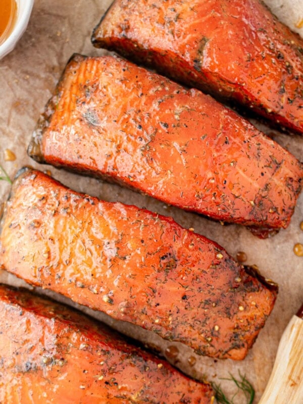 a photo of several salmon filets that have been smoked and seasoned